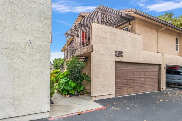 a view of house with garage