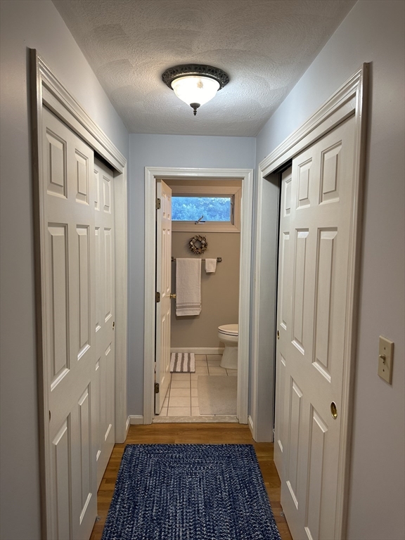 21 Tulip Circle, Unit 21 Haverhill, MA 01830 - Photo 16 of 26 a view of a hallway