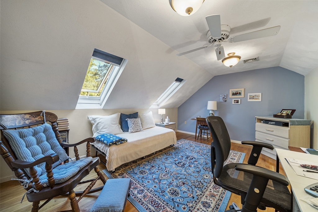 21 Tulip Circle, Unit 21 Haverhill, MA 01830 - Photo 21 of 26 a bedroom with 2 bed table chair and a window