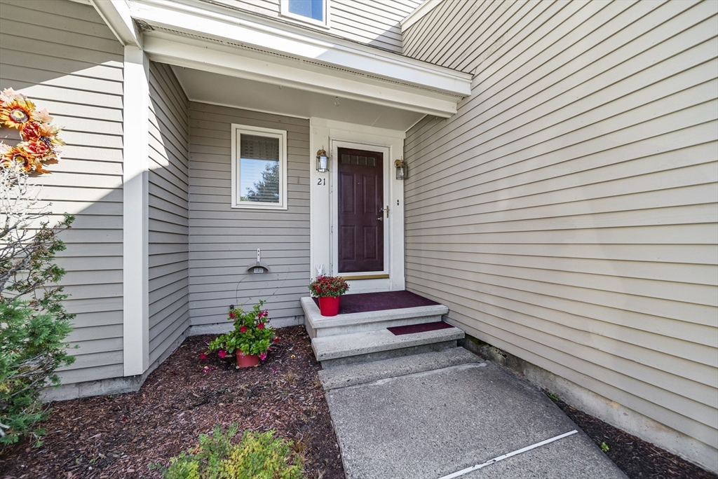 21 Tulip Circle, Unit 21 Haverhill, MA 01830 - Photo 23 of 26 a view of a house with a yard