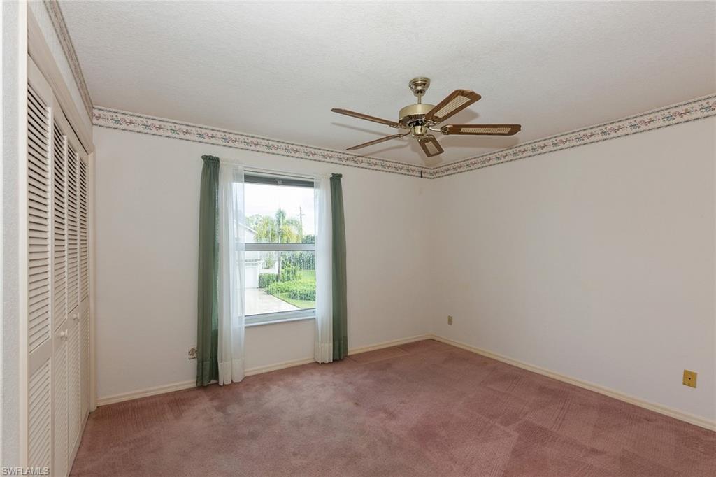 1535 Trafalgar Lane, Unit R201 Naples, FL 34116 - Photo 7 of 10 a view of a room with a window