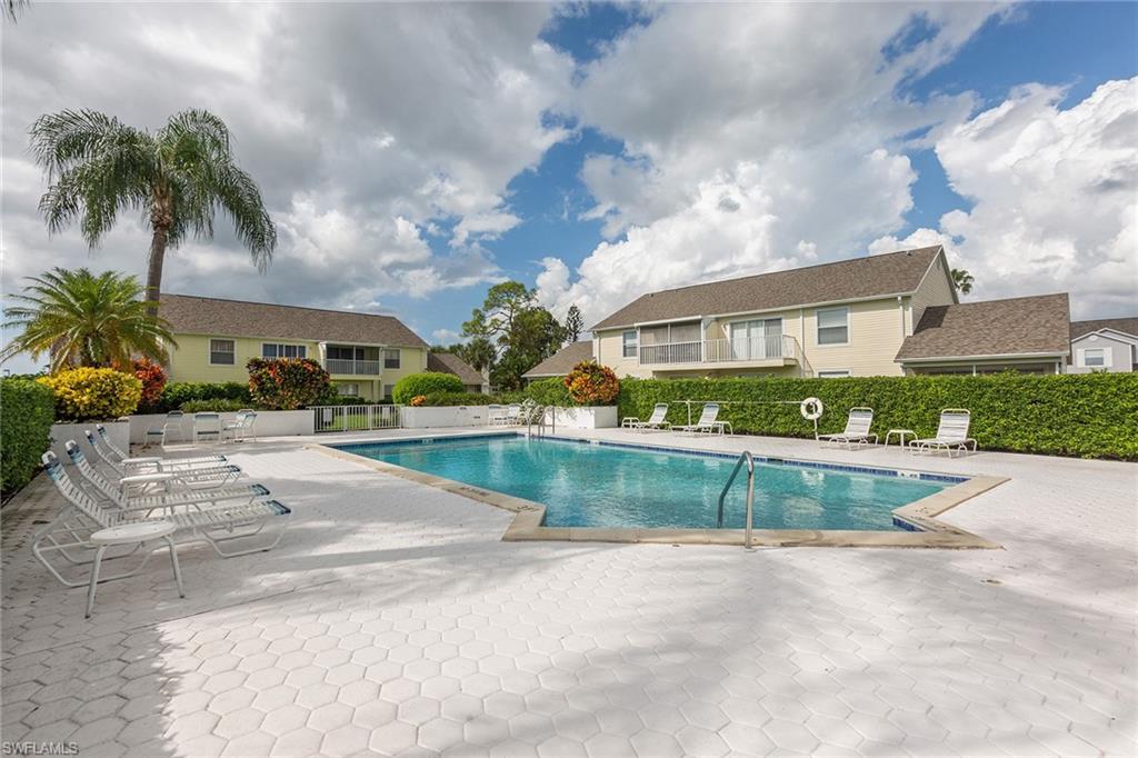 1535 Trafalgar Lane, Unit R201 Naples, FL 34116 - Photo 9 of 10 a view of house with outdoor space
