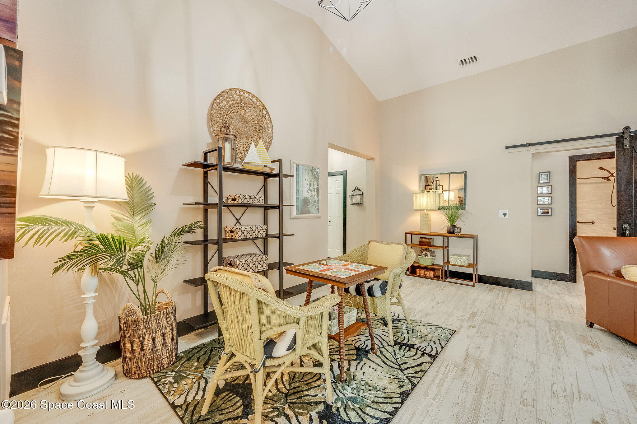 3911 Joslin Way Melbourne, FL 32904 - Photo 11 of 63 a view of a room with furniture and wooden floor