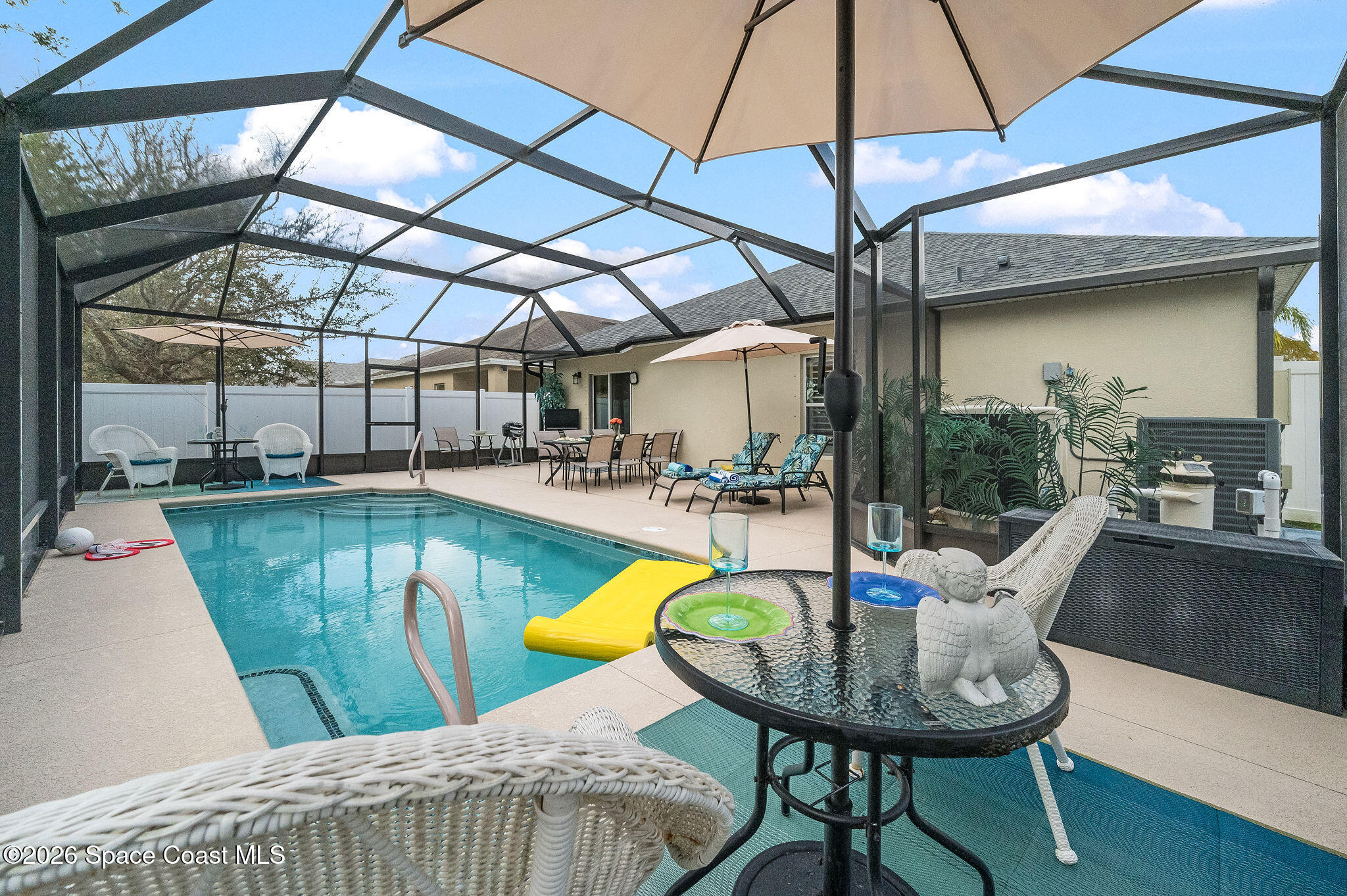 3911 Joslin Way Melbourne, FL 32904 - Photo 48 of 63 a view of a swimming pool with a patio