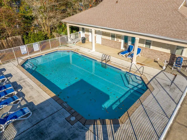 a view of balcony with deck and outdoor seating