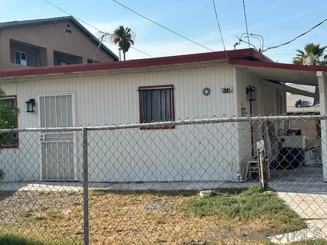 510 East 3rd Street Calexico, CA 92231 - Photo 2 of 4 a front view of a house with a yard