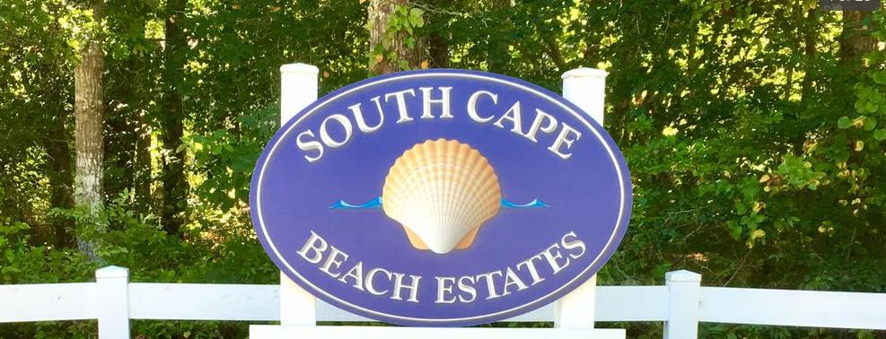 2 Pontiac Road Mashpee, MA 02649 - Photo 2 of 15 a view of a wooden floor with a sign board