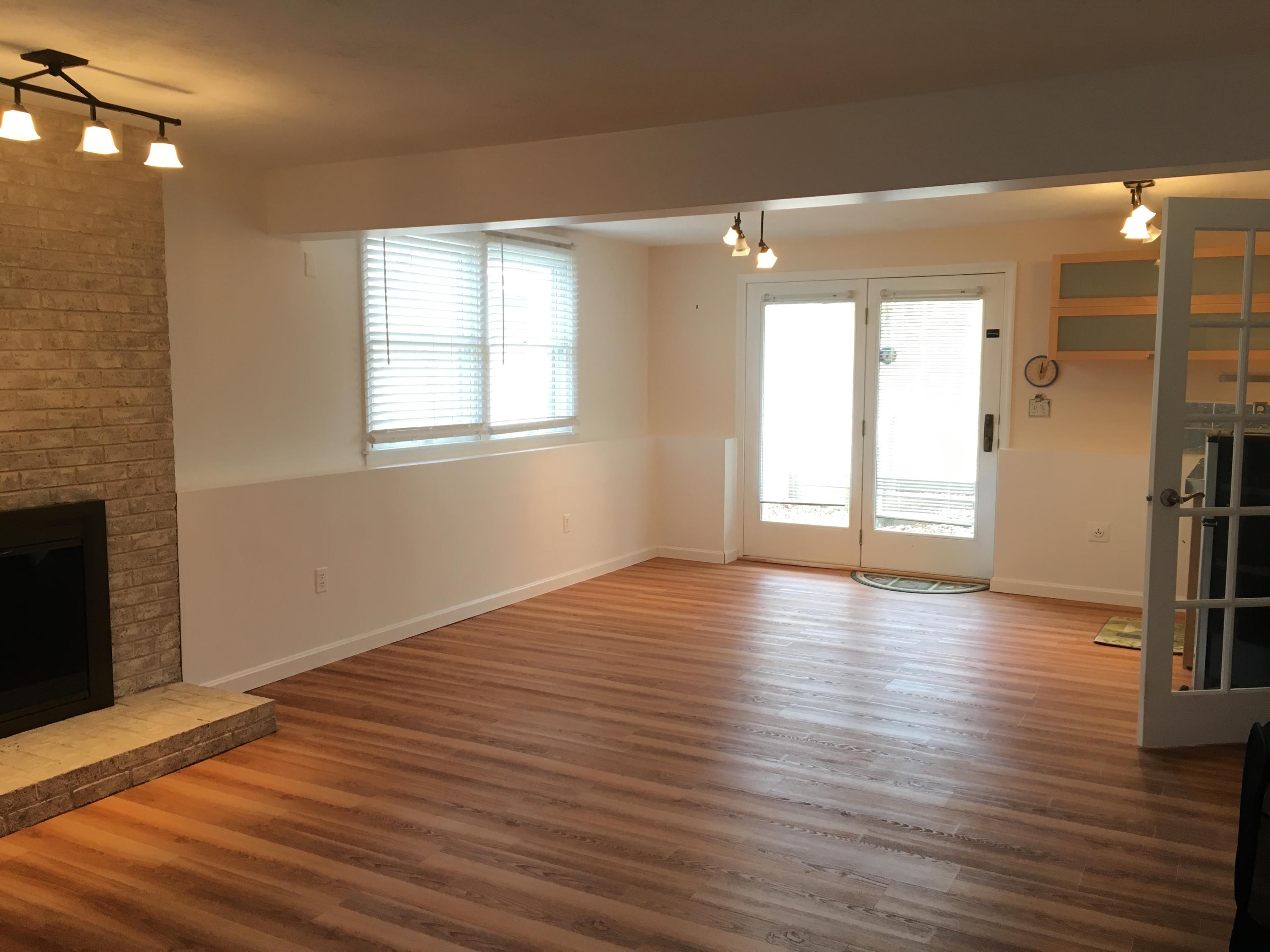 2 Pontiac Road Mashpee, MA 02649 - Photo 9 of 15 a view of an empty room with wooden floor and a window