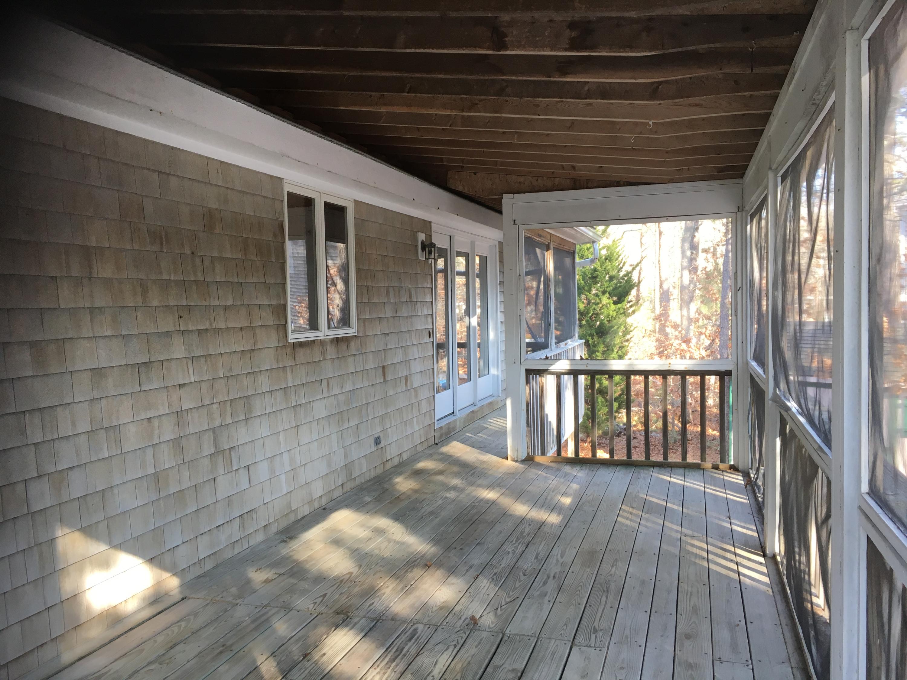 2 Pontiac Road Mashpee, MA 02649 - Photo 10 of 15 a view of porch with wooden floor