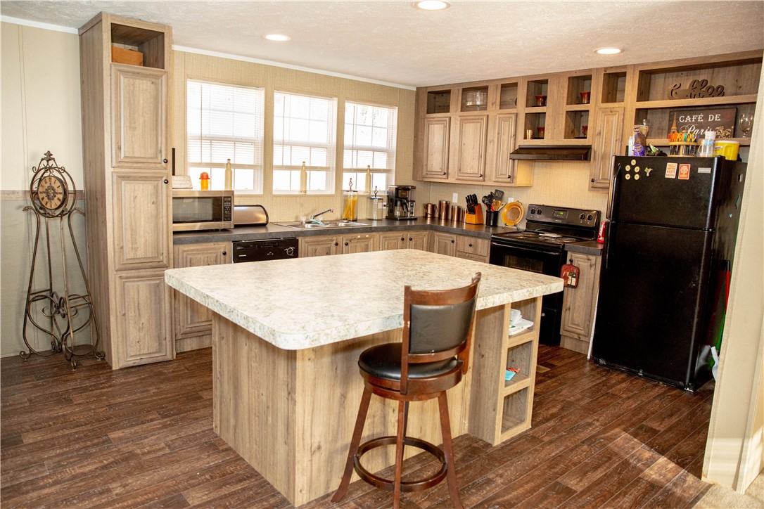 454 East Westbrook Road Seneca, SC 29678 - Photo 4 of 15 Center island with plenty of storage.