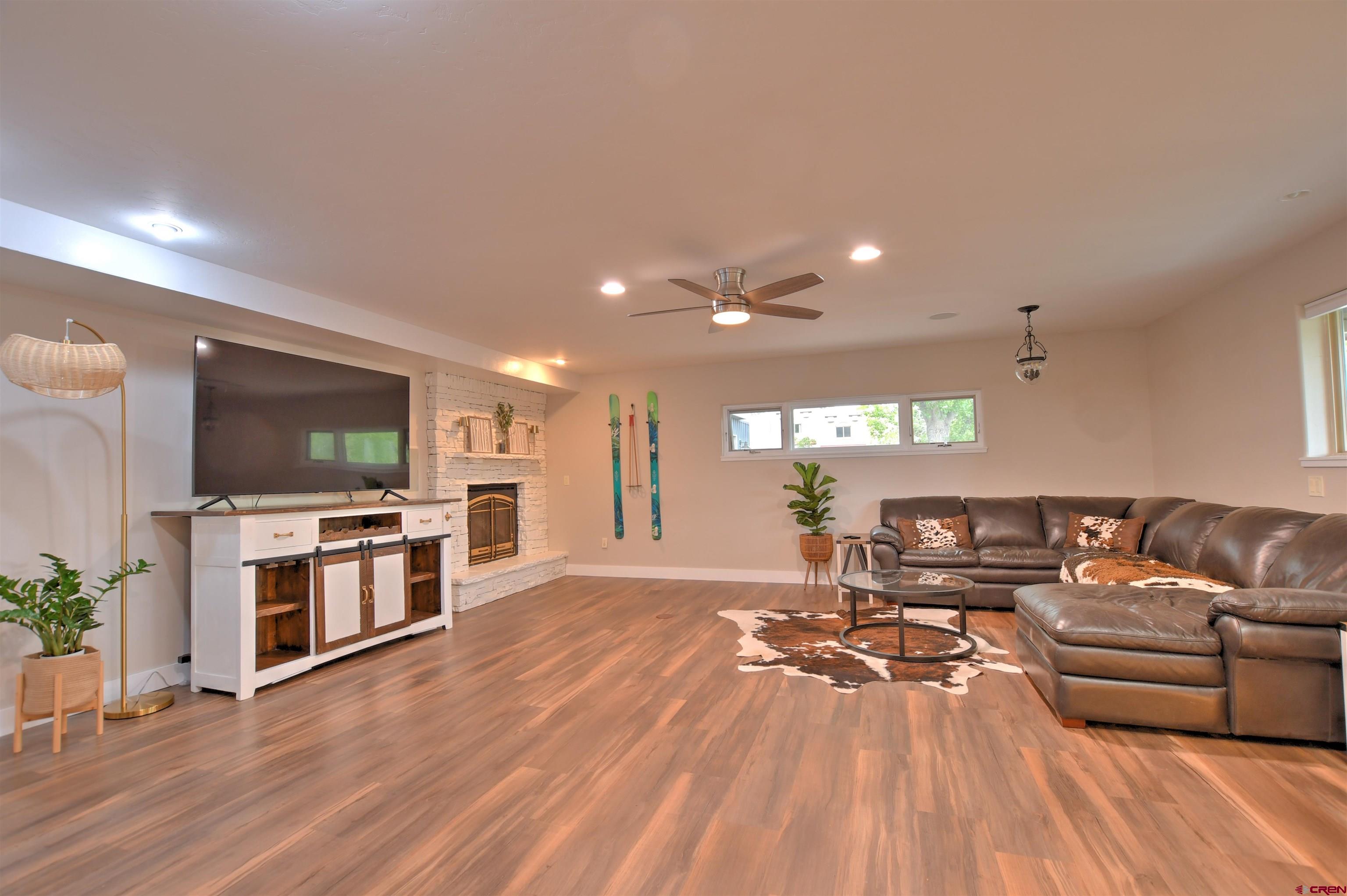 602 Chipeta Drive Ridgway, CO 81432 - Photo 19 of 41 a living room with furniture and a flat screen tv