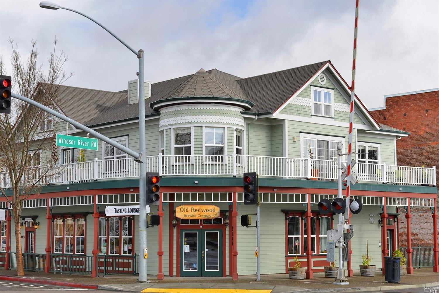 9022 Windsor Road Windsor, CA 95492 - Photo 1 of 1 a view of a food market with retail stalls