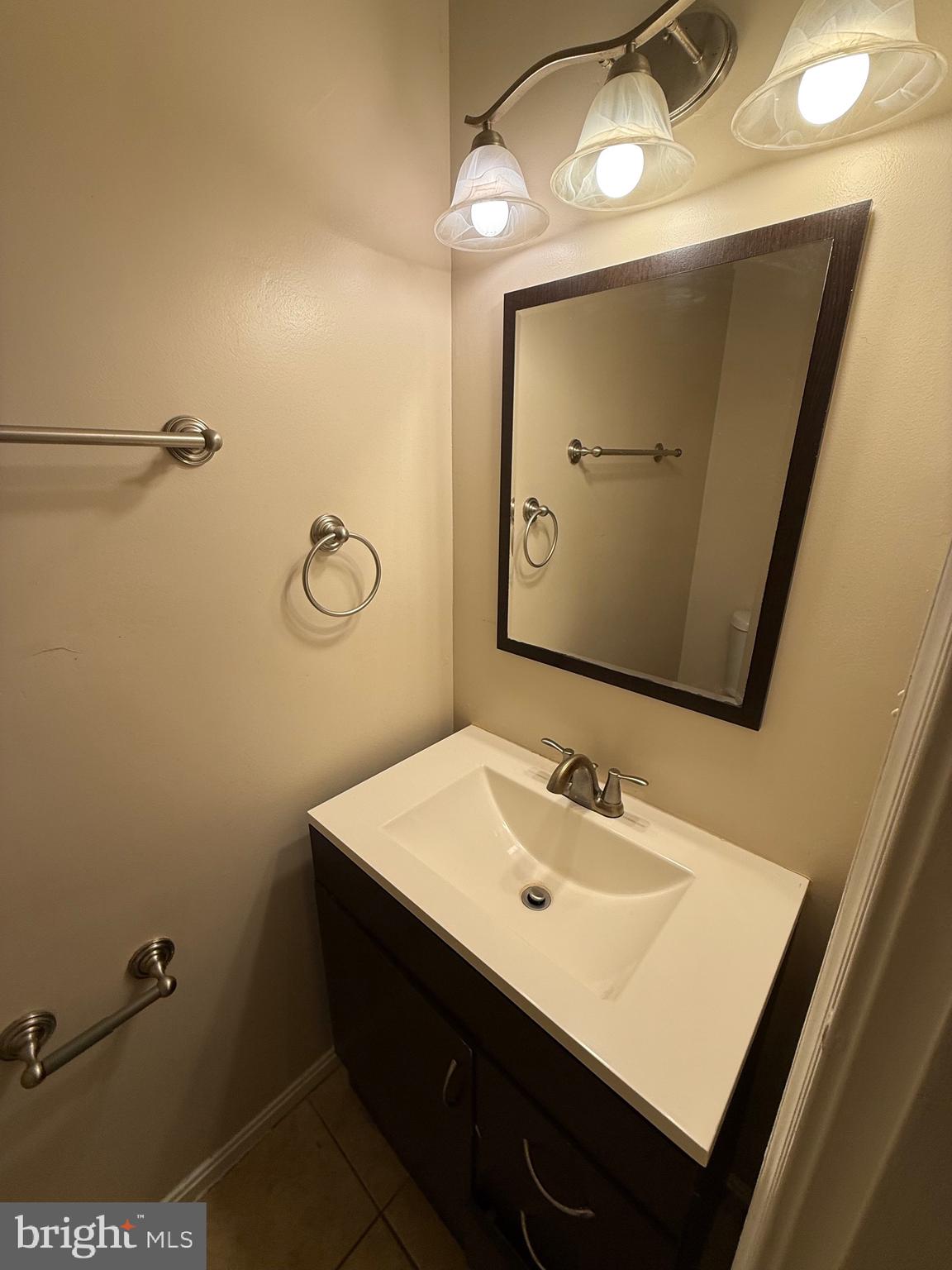 3361 Ryon Court Waldorf, MD 20601 - Photo 5 of 15 a bathroom with a sink vanity and a mirror