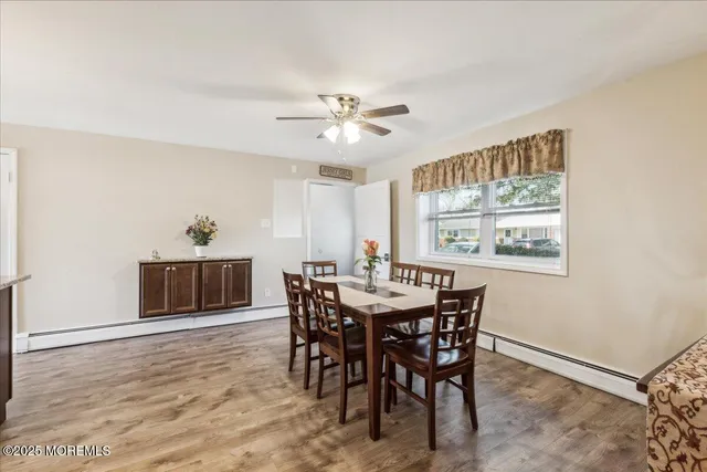 a view of a dining room with furniture