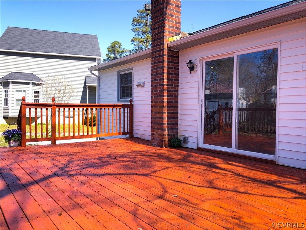 14100 South Hackberry Road Chester, VA 23836 - Photo 16 of 42 a view of a house with a roof deck