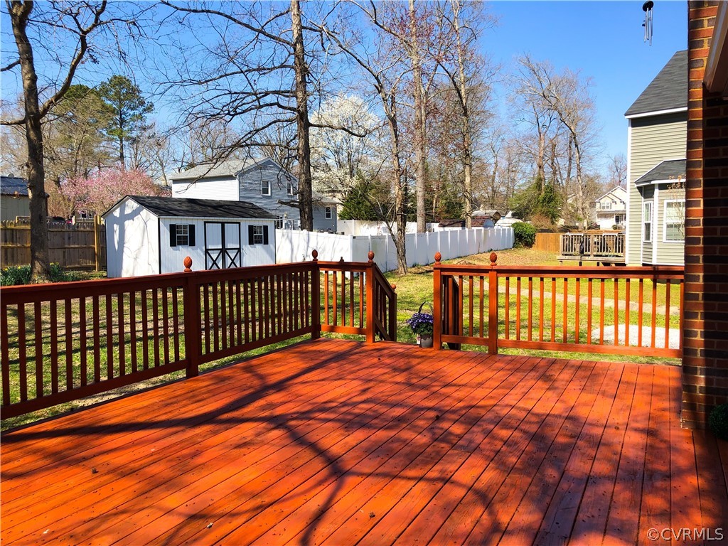 14100 South Hackberry Road Chester, VA 23836 - Photo 17 of 42 a balcony with trees in front of it