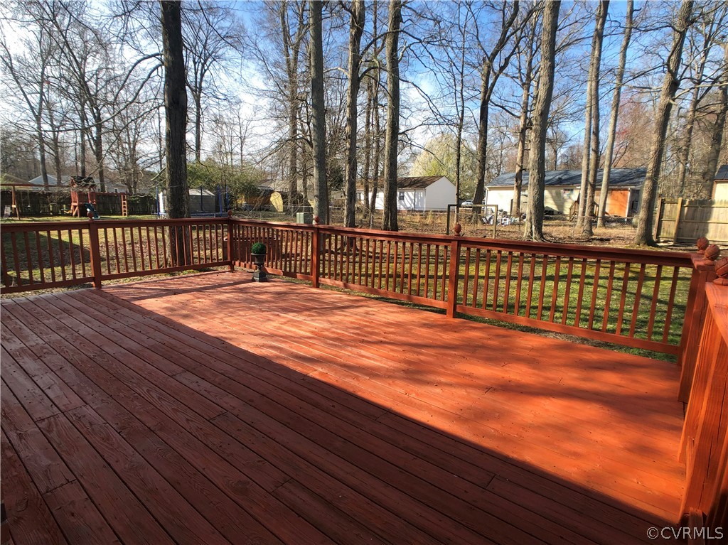 14100 South Hackberry Road Chester, VA 23836 - Photo 18 of 42 a view of a tennis court