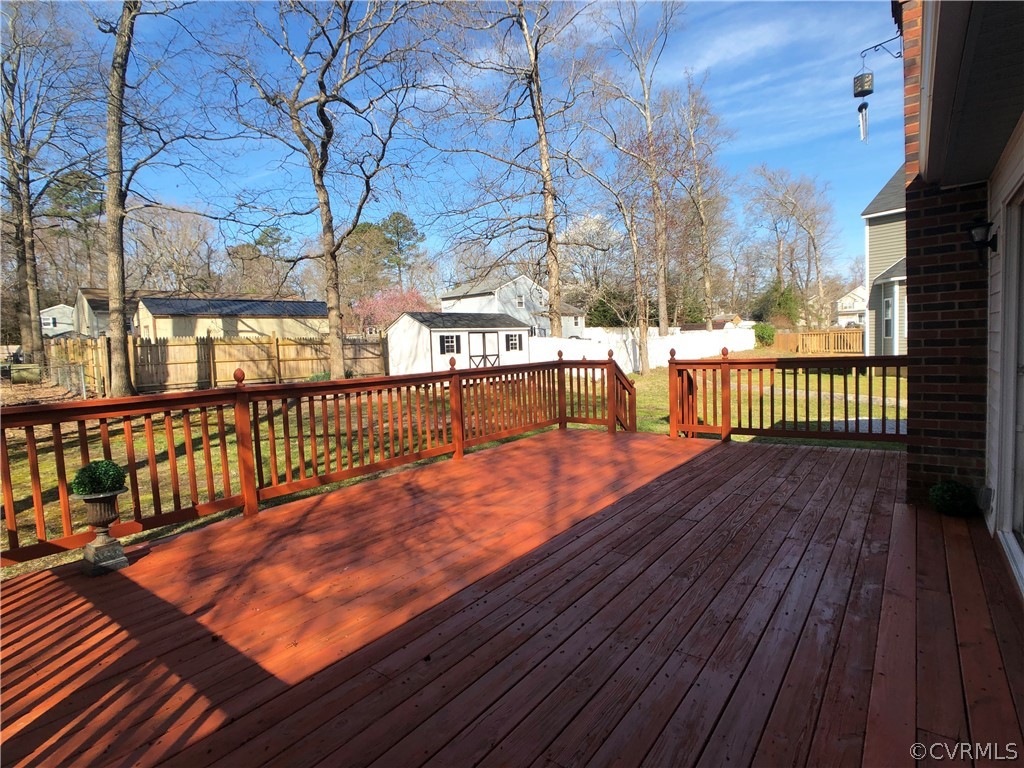 14100 South Hackberry Road Chester, VA 23836 - Photo 19 of 42 a view of balcony with wooden floor
