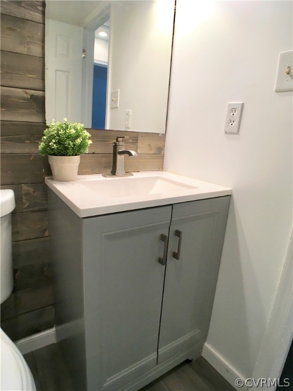 14100 South Hackberry Road Chester, VA 23836 - Photo 26 of 42 a bathroom with a sink and mirror