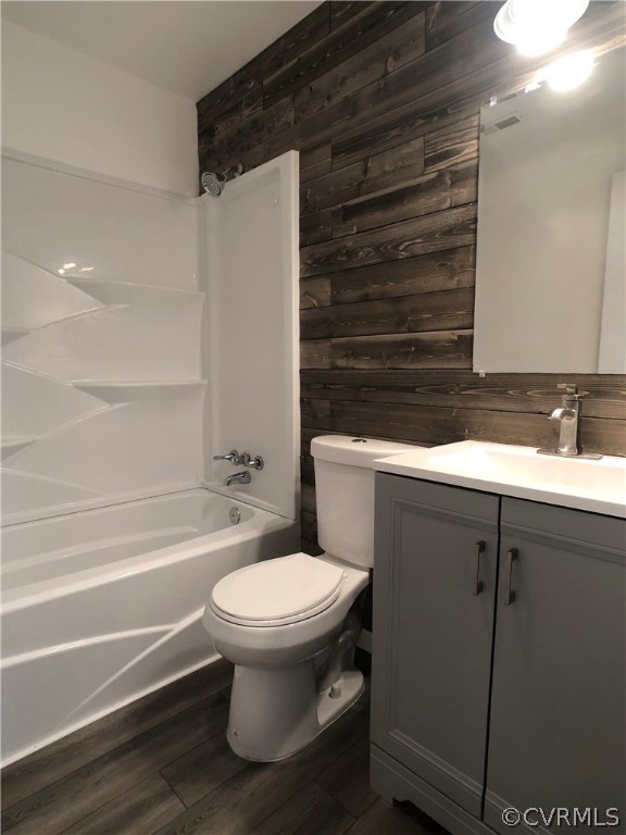 14100 South Hackberry Road Chester, VA 23836 - Photo 28 of 42 a bathroom with a sink a toilet and shower