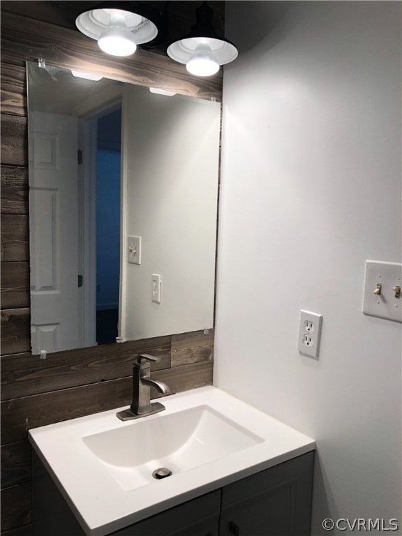 14100 South Hackberry Road Chester, VA 23836 - Photo 29 of 42 a bathroom with a sink and a mirror