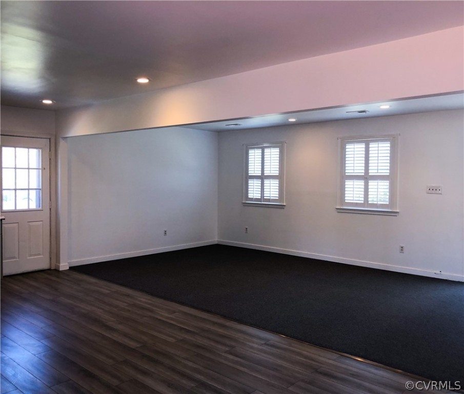 14100 South Hackberry Road Chester, VA 23836 - Photo 33 of 42 a view of an empty room with wooden floor and a window