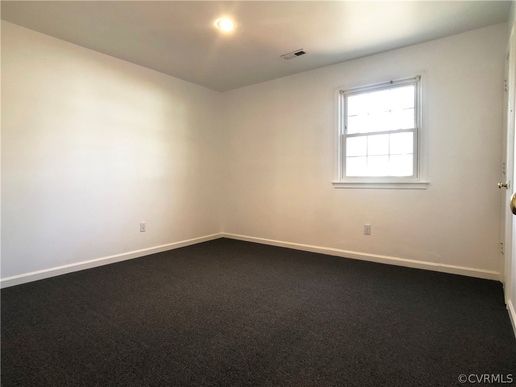 14100 South Hackberry Road Chester, VA 23836 - Photo 34 of 42 an empty room with a window