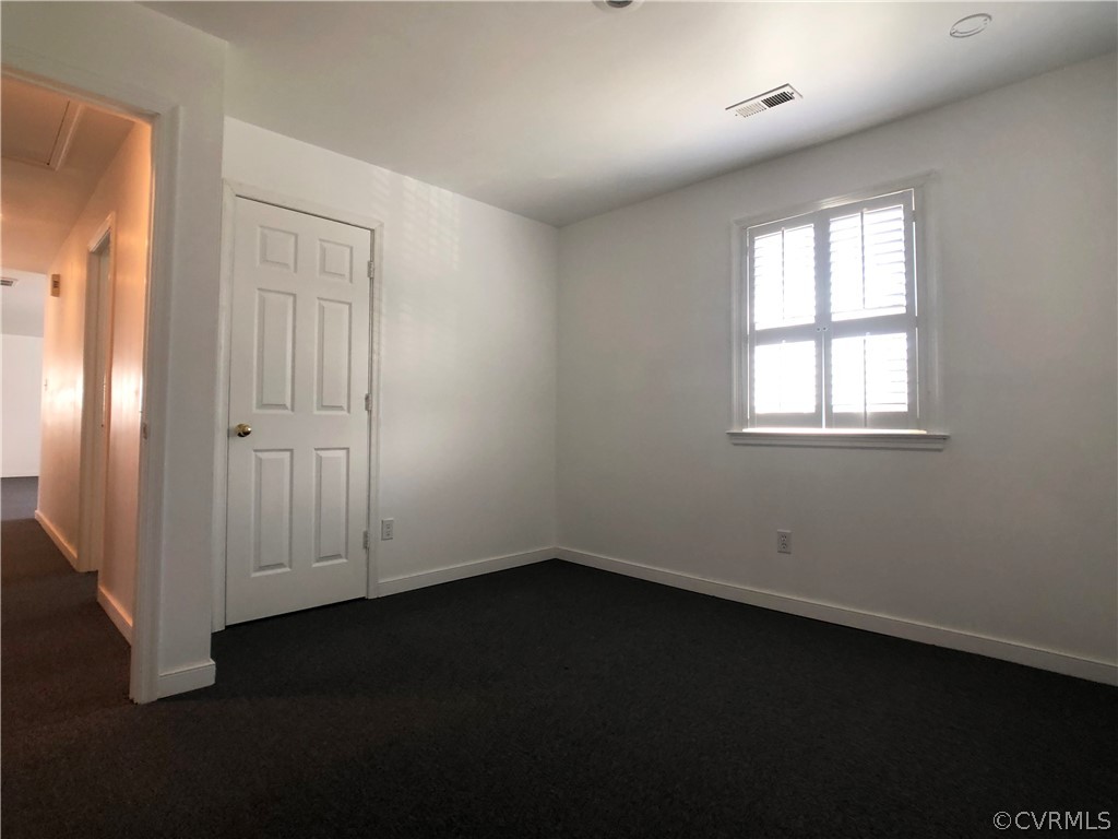 14100 South Hackberry Road Chester, VA 23836 - Photo 37 of 42 an empty room with a window