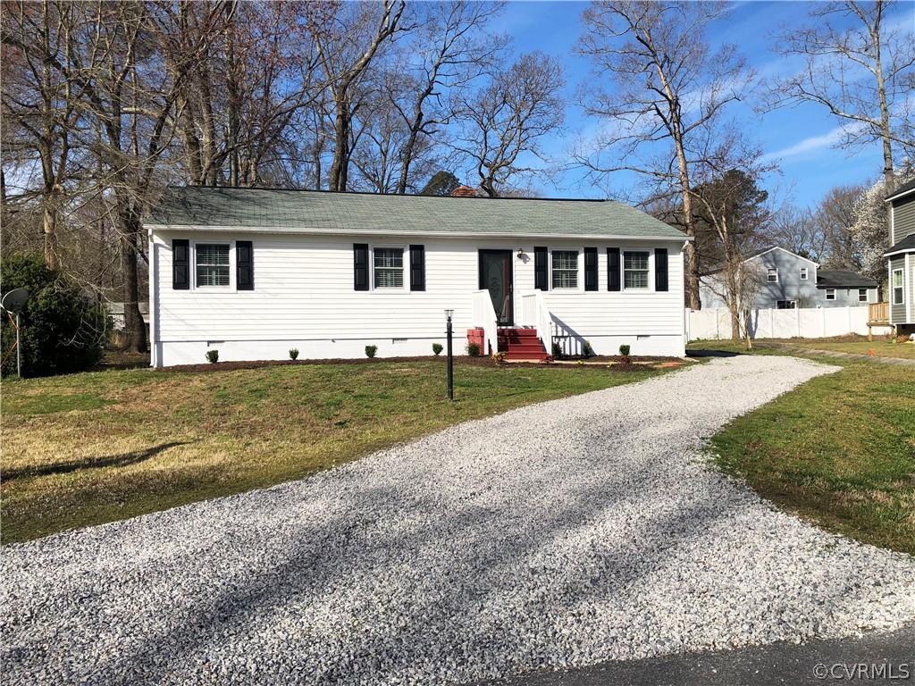 14100 South Hackberry Road Chester, VA 23836 - Photo 41 of 42 a front view of a house with a yard