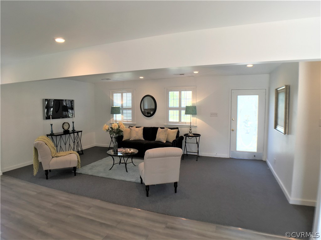 14100 South Hackberry Road Chester, VA 23836 - Photo 8 of 42 a living room with furniture and a wooden floor