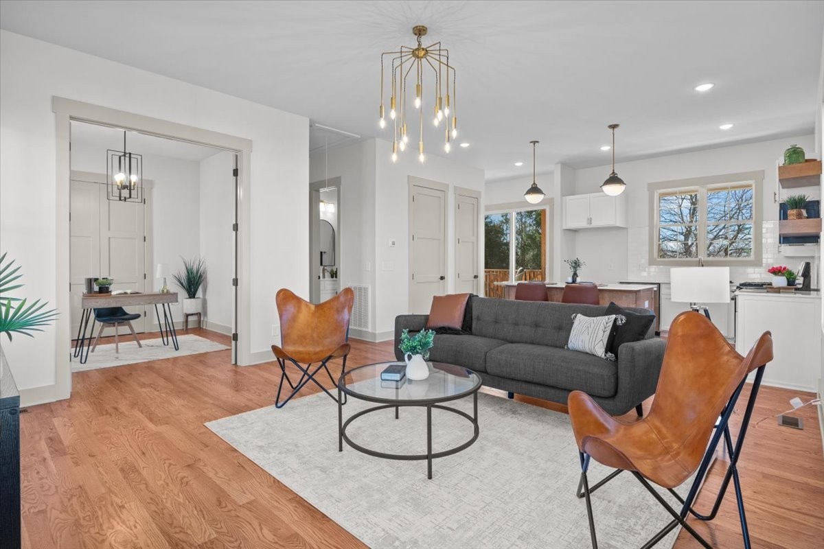 795 Jason Chapel Road Dickson, TN 37055 - Photo 11 of 35 a living room with furniture and a chandelier