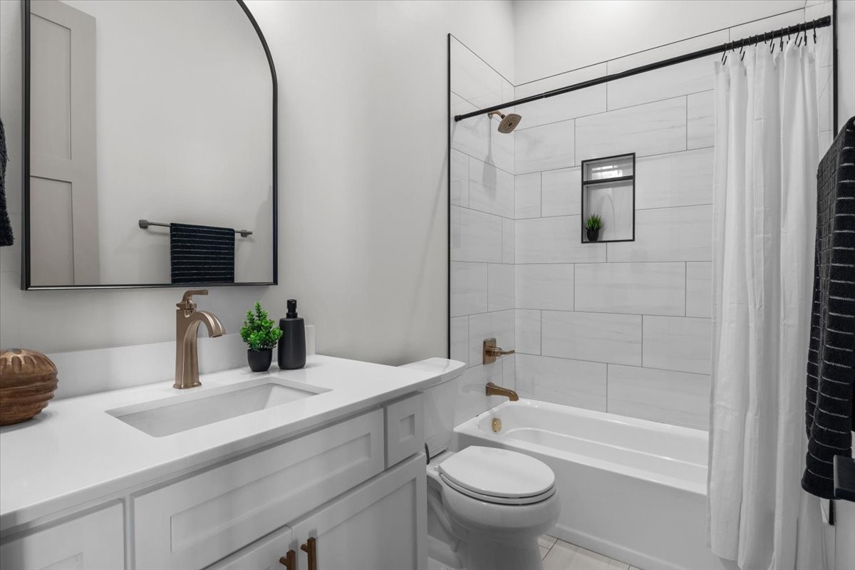 795 Jason Chapel Road Dickson, TN 37055 - Photo 19 of 35 a bathroom with a granite countertop sink a toilet and shower