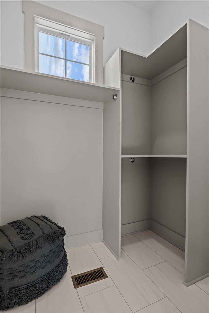 795 Jason Chapel Road Dickson, TN 37055 - Photo 28 of 35 a room with a closet and a window