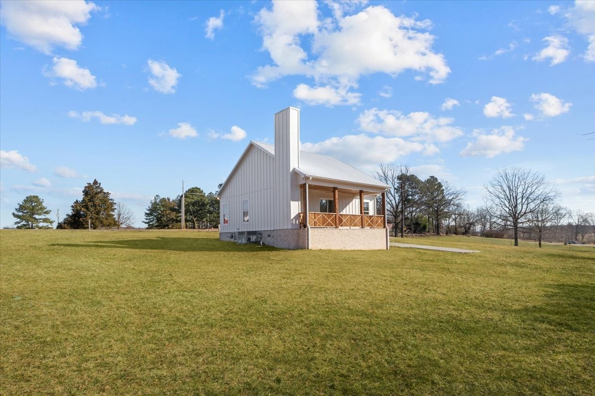 795 Jason Chapel Road Dickson, TN 37055 - Photo 35 of 35 a view of a big room with an empty space and a lake view