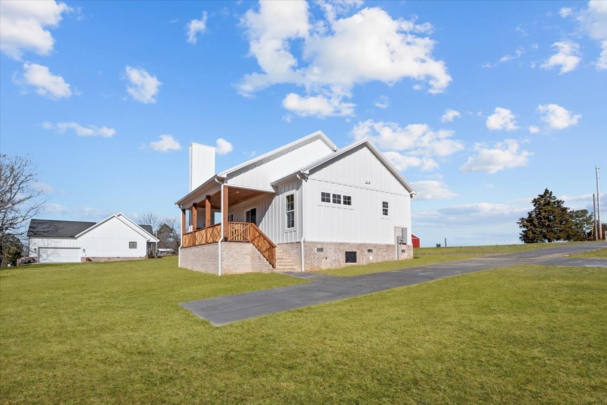 795 Jason Chapel Road Dickson, TN 37055 - Photo 7 of 35 a view of a house with backyard and garden