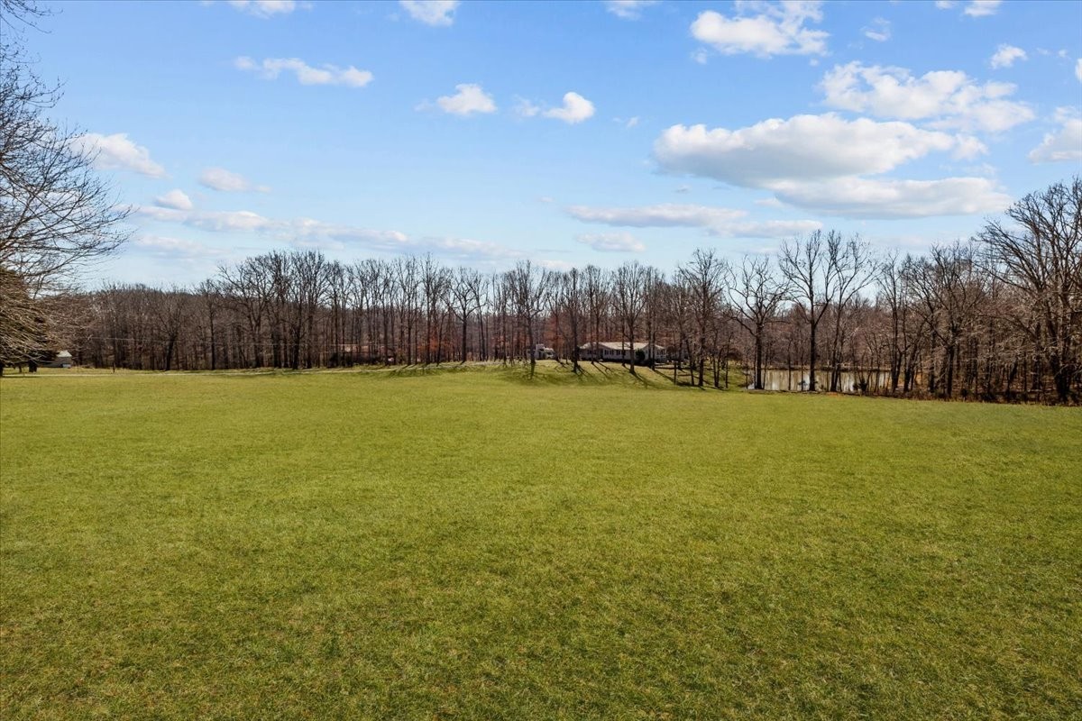 795 Jason Chapel Road Dickson, TN 37055 - Photo 9 of 35 a view of a swimming pool and trees in the background
