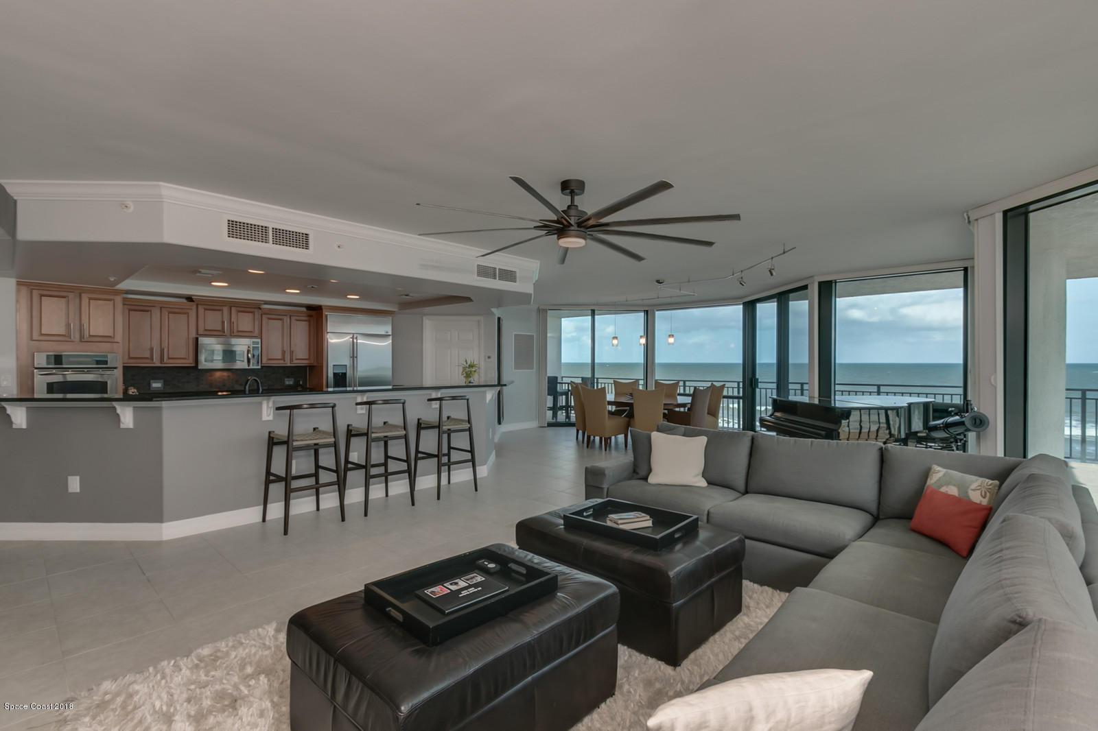 1323 Florida A1A, Unit 302 Satellite Beach, FL 32937 - Photo 11 of 38 21-Living Area-Kitchen