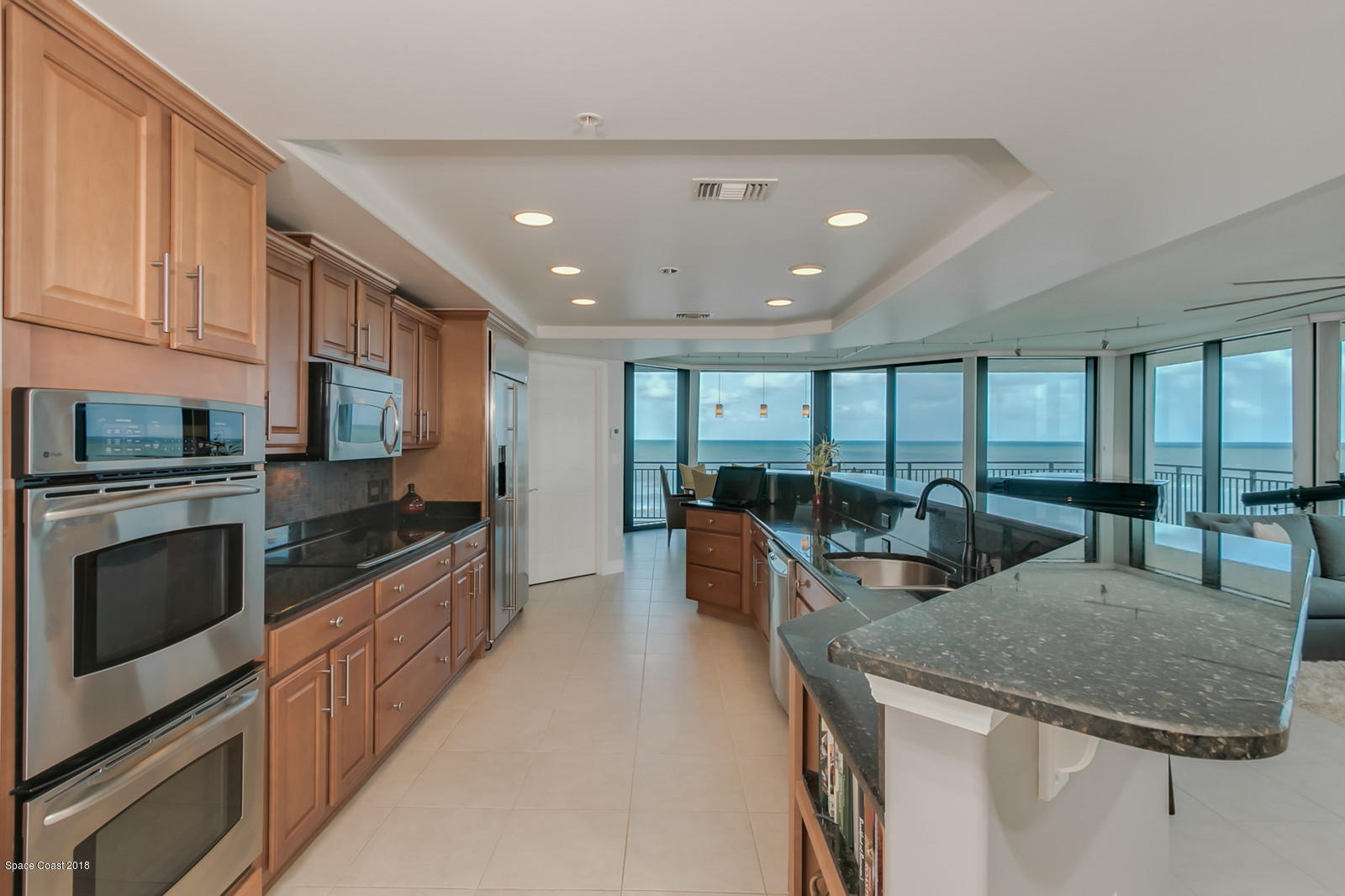1323 Florida A1A, Unit 302 Satellite Beach, FL 32937 - Photo 13 of 38 23-Living Area-Kitchen