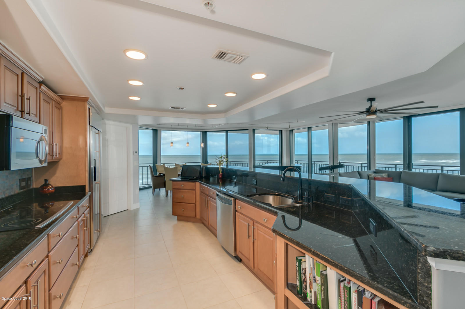 1323 Florida A1A, Unit 302 Satellite Beach, FL 32937 - Photo 16 of 38 26-Living Area-Kitchen
