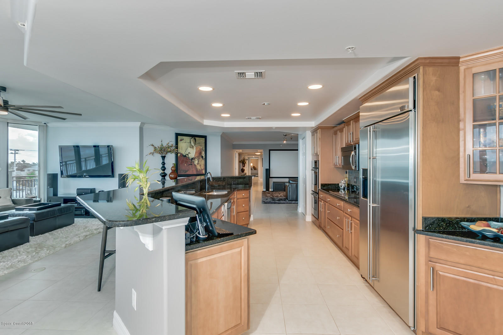1323 Florida A1A, Unit 302 Satellite Beach, FL 32937 - Photo 18 of 38 28-Living Area-Kitchen