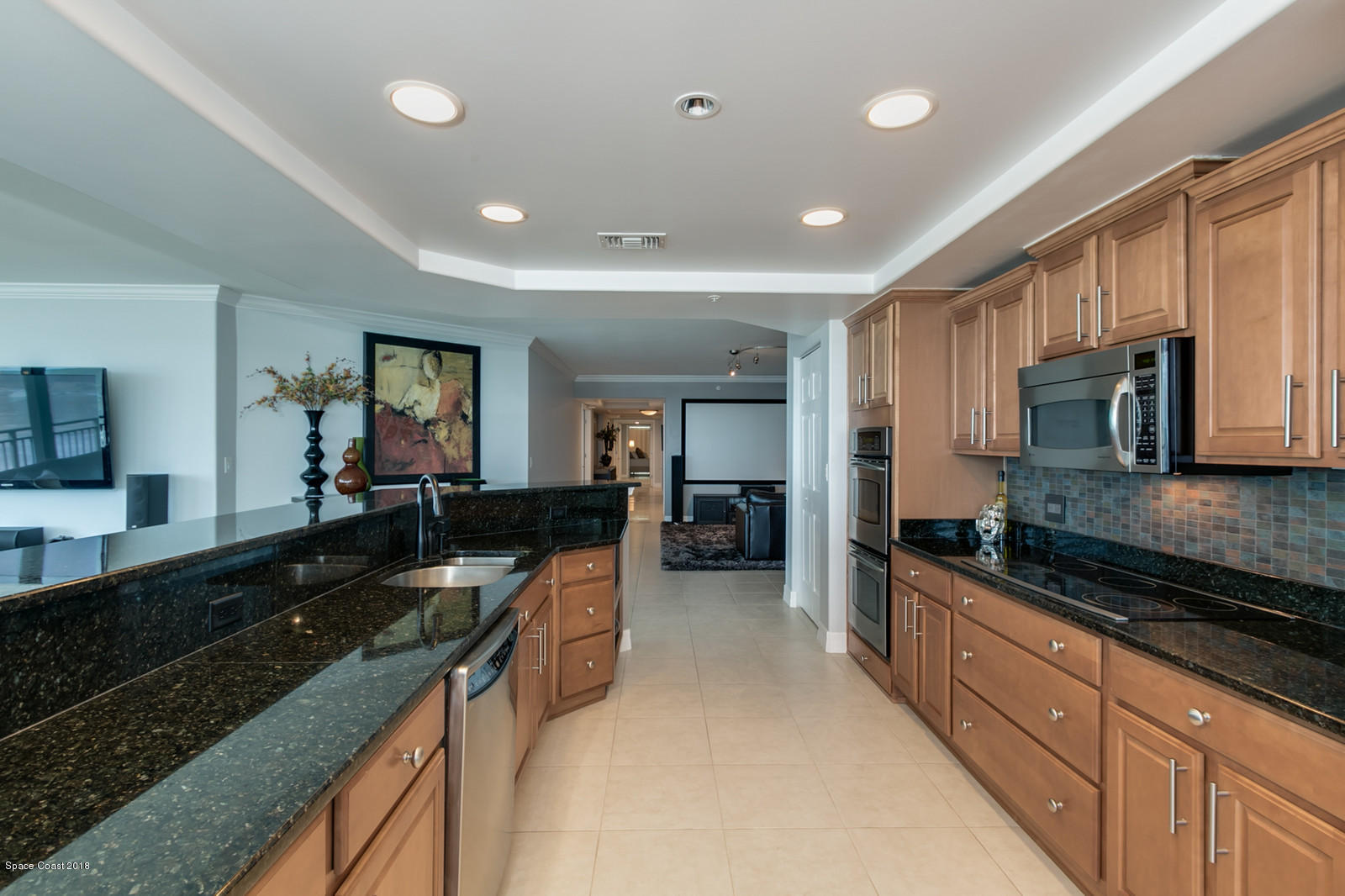 1323 Florida A1A, Unit 302 Satellite Beach, FL 32937 - Photo 19 of 38 29-Living Area-Kitchen