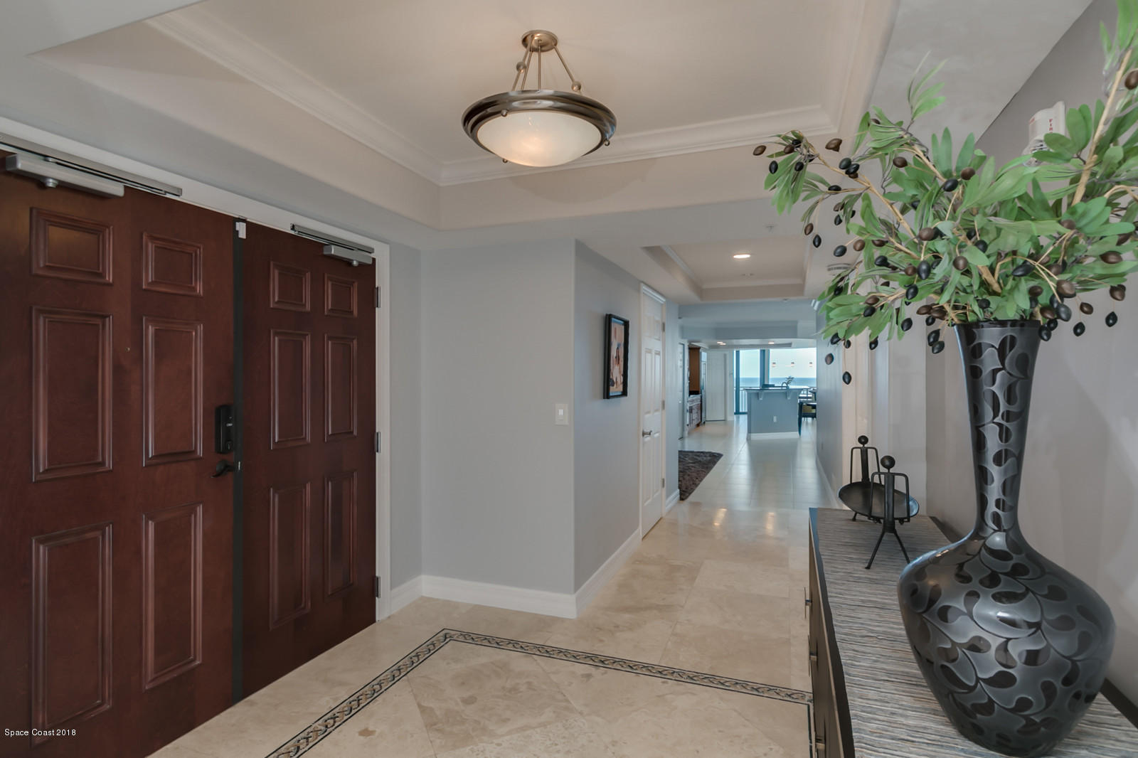 1323 Florida A1A, Unit 302 Satellite Beach, FL 32937 - Photo 5 of 38 04-Hallway Facing East