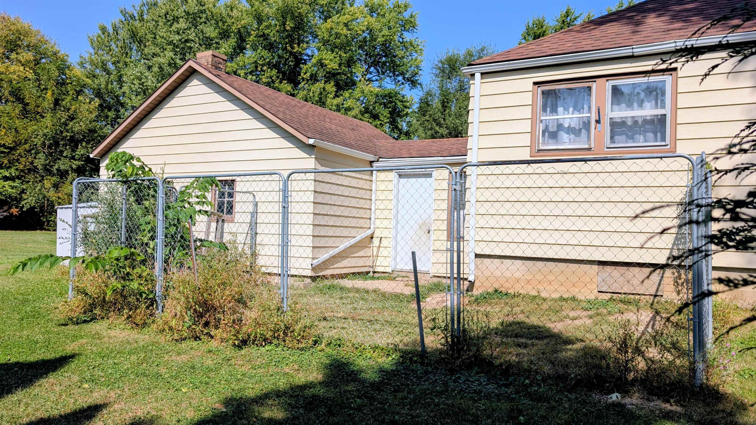 2156 North Leaf River Road Mount Morris, IL 61054 - Photo 16 of 21 a view of house with backyard and garden