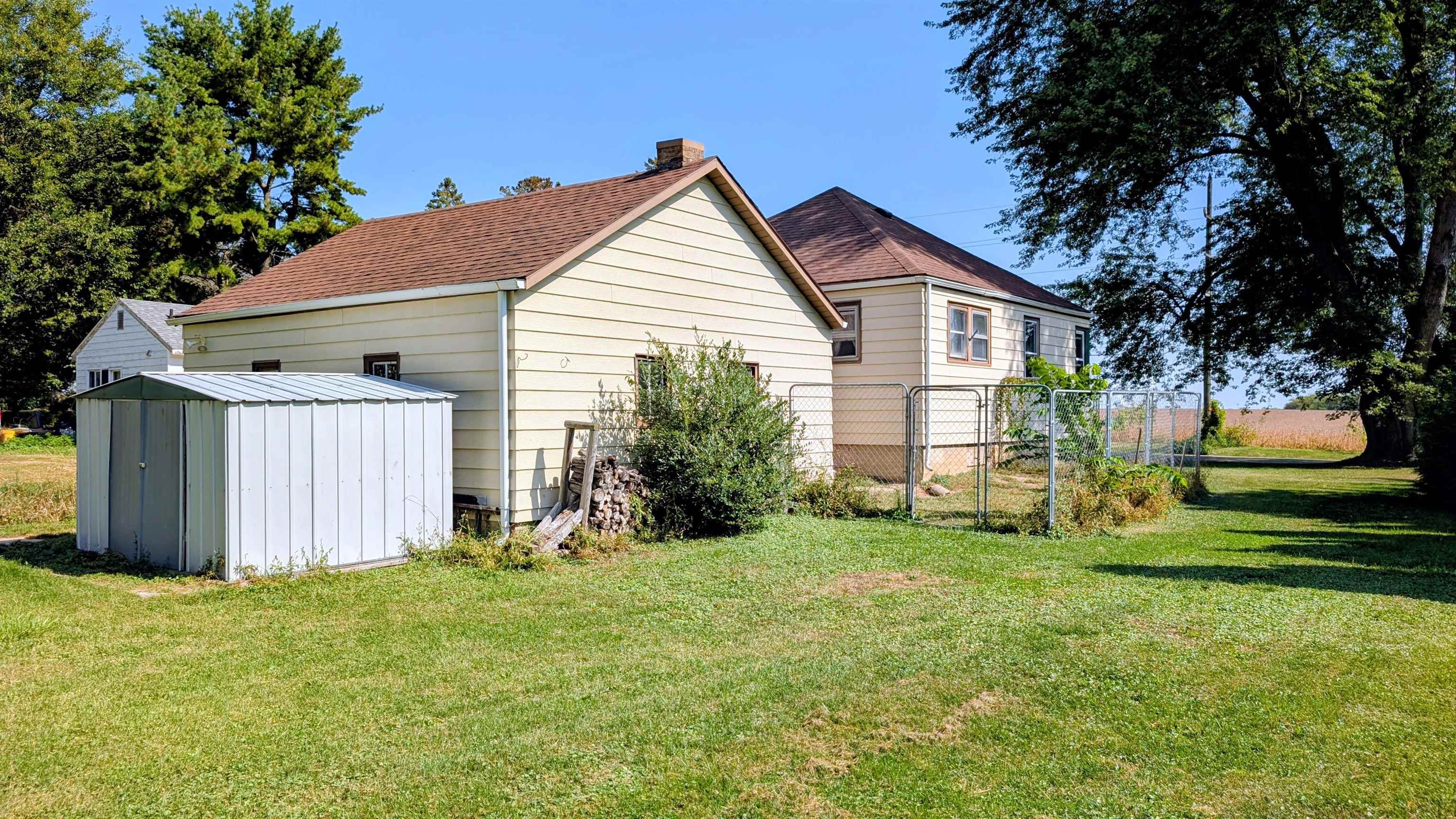 2156 North Leaf River Road Mount Morris, IL 61054 - Photo 18 of 21 a view of a house with backyard and garden