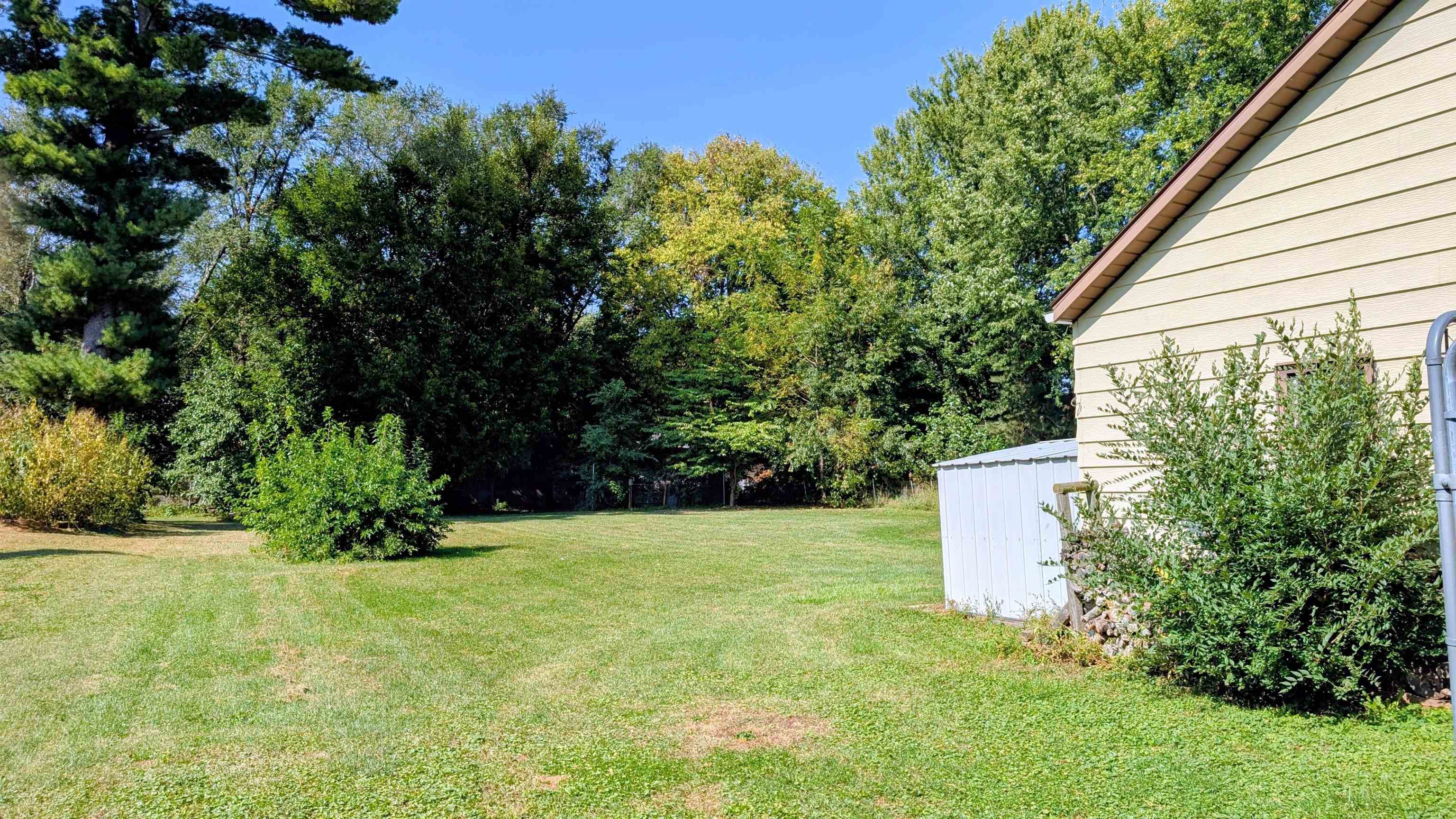 2156 North Leaf River Road Mount Morris, IL 61054 - Photo 19 of 21 a view of a garden with large trees