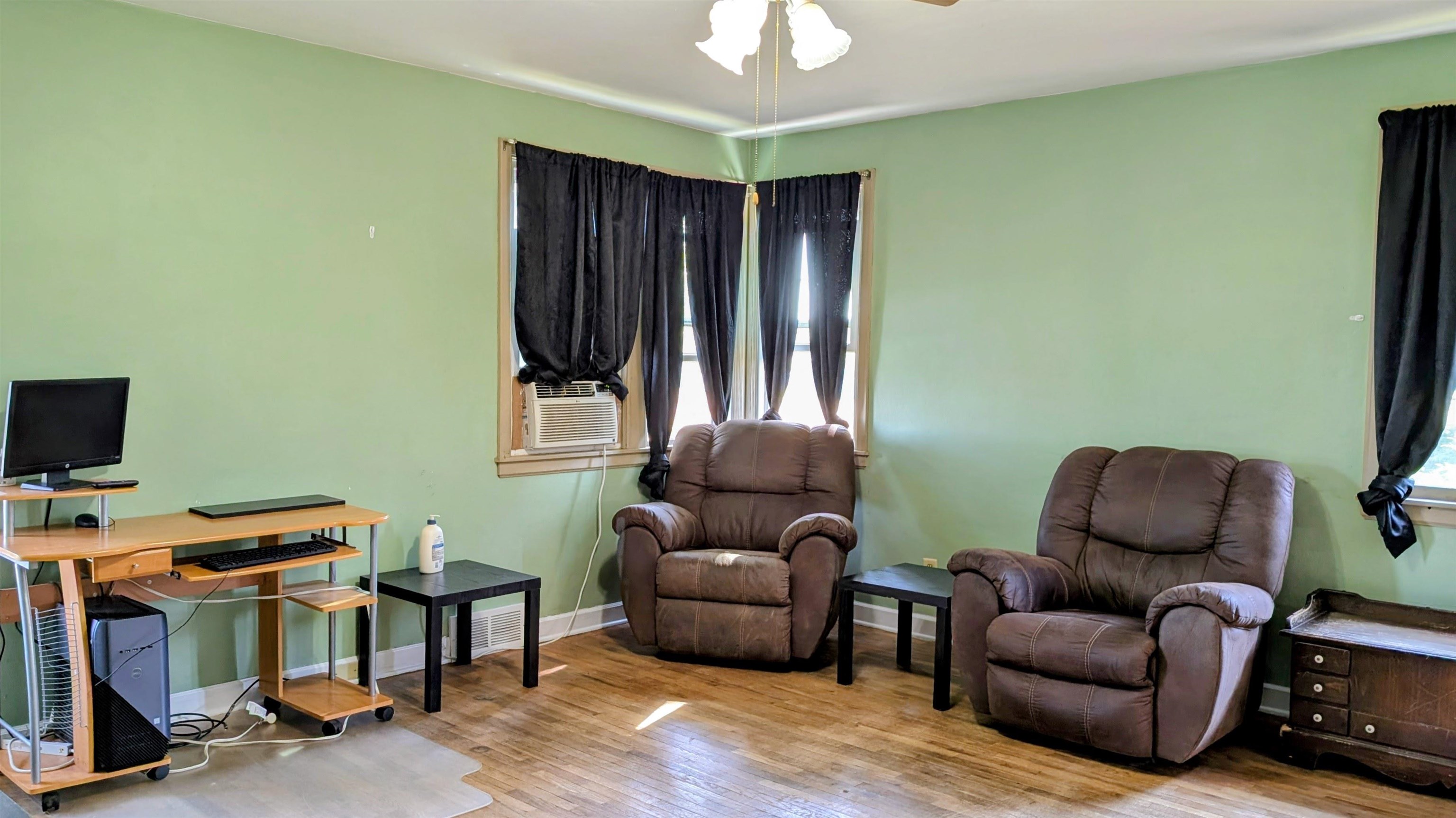 2156 North Leaf River Road Mount Morris, IL 61054 - Photo 3 of 21 a living room with furniture and a flat screen tv