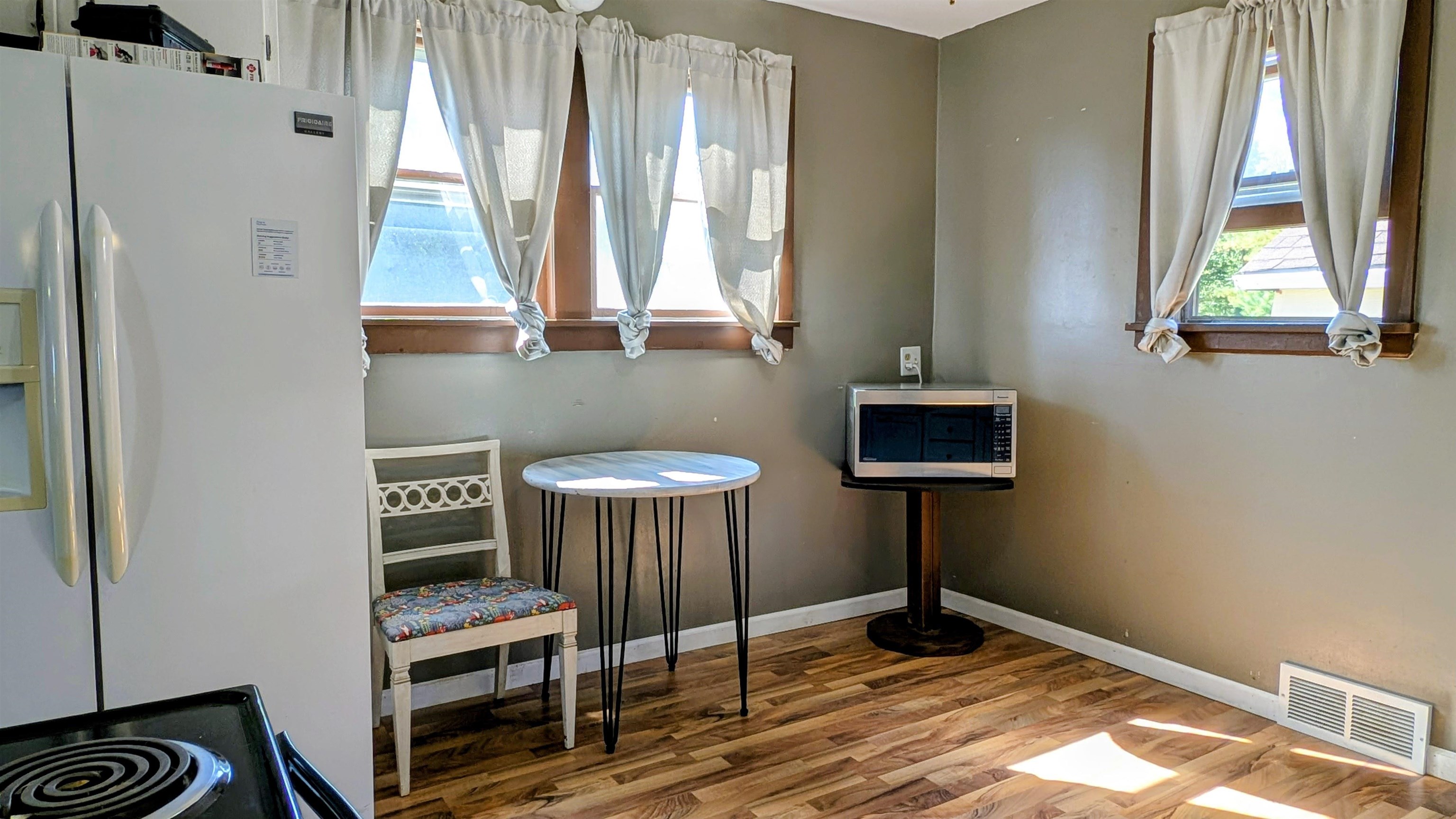 2156 North Leaf River Road Mount Morris, IL 61054 - Photo 8 of 21 a view of room with window and wooden floor