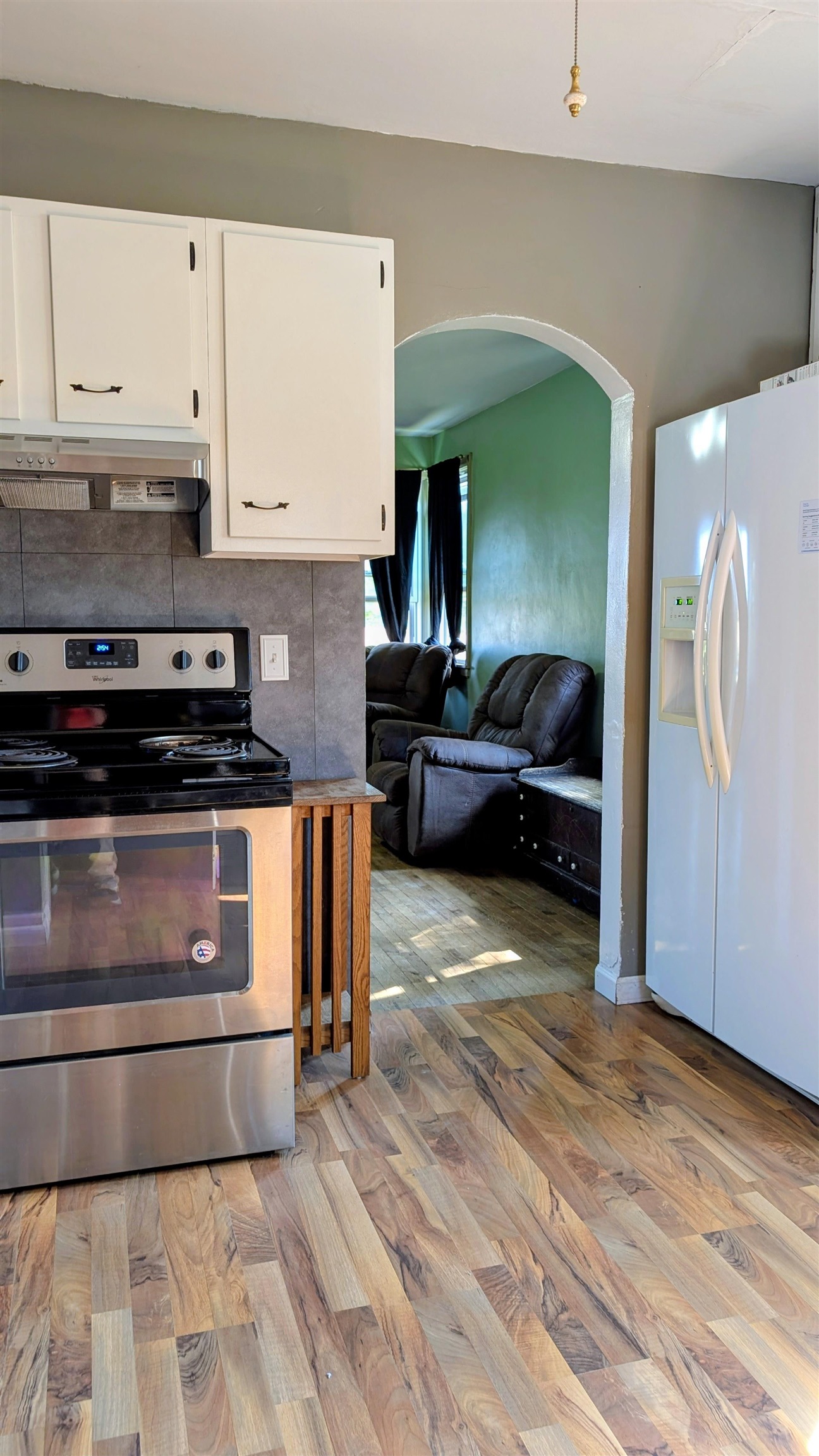 2156 North Leaf River Road Mount Morris, IL 61054 - Photo 9 of 21 a kitchen with stainless steel appliances granite countertop a stove a sink and a refrigerator