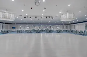 a kitchen with stainless steel appliances granite countertop a sink and a white cabinets