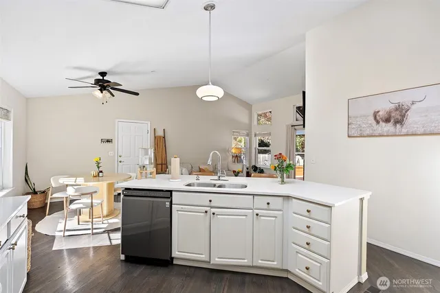 a room with a sink and a window